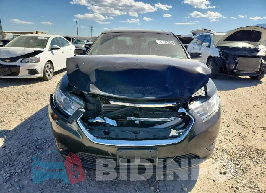 1FAHP2E81JG134961 Photo# 5