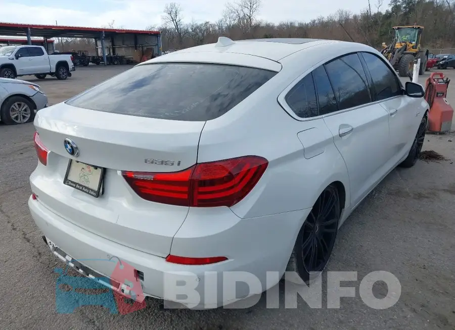 WBA5M4C57FD184036 Photo# 4