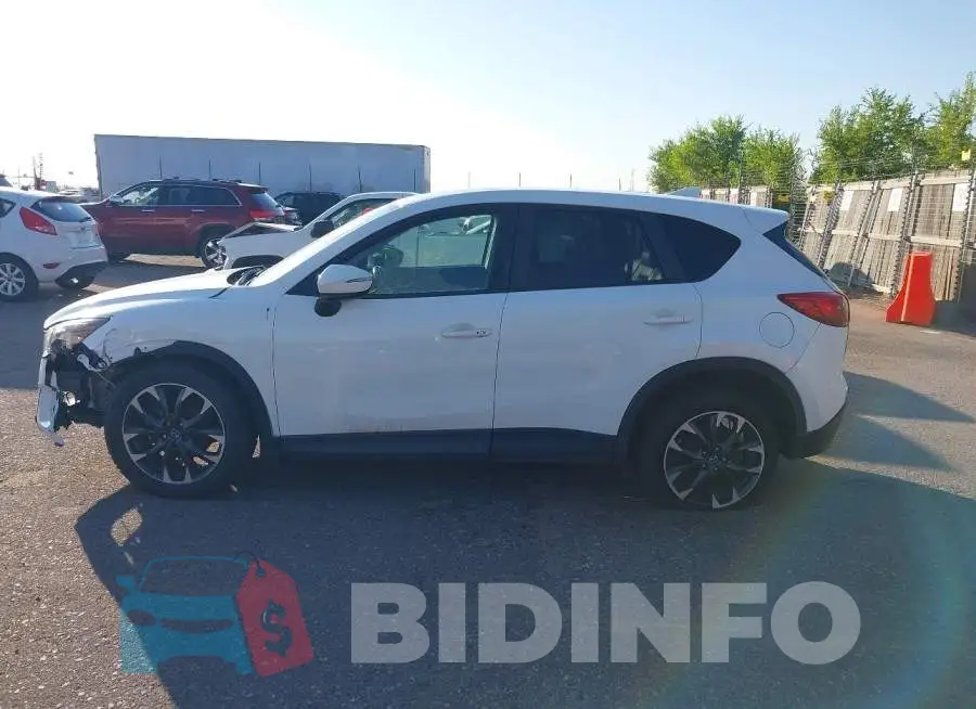 JM3KE4DY5G0630230 Photo# 14