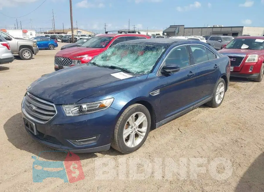 1FAHP2E8XGG141237 Photo# 2