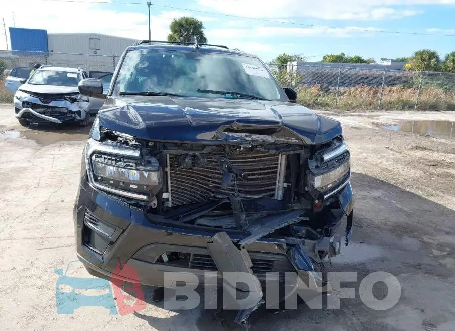 1FMJK1J82REA10128 Photo# 6