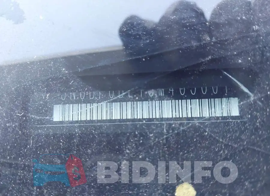 JN8BF0BE1SM465001 Photo# 9
